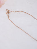 Bow With A Hanging Heart Chain