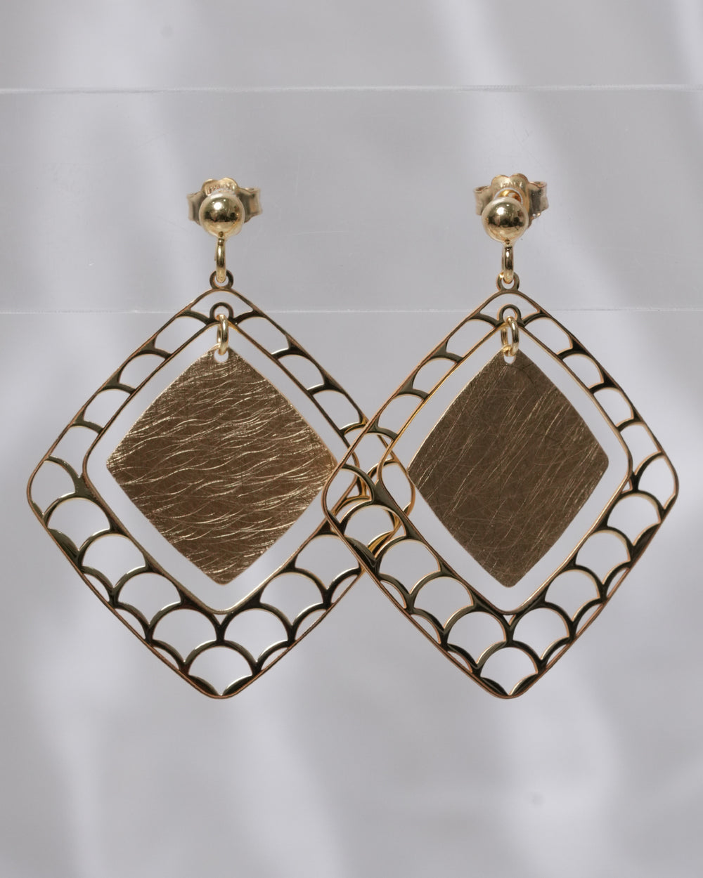 Hollow Geometric Diamond Shaped Earnings